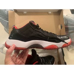 bred jordan 11 lows